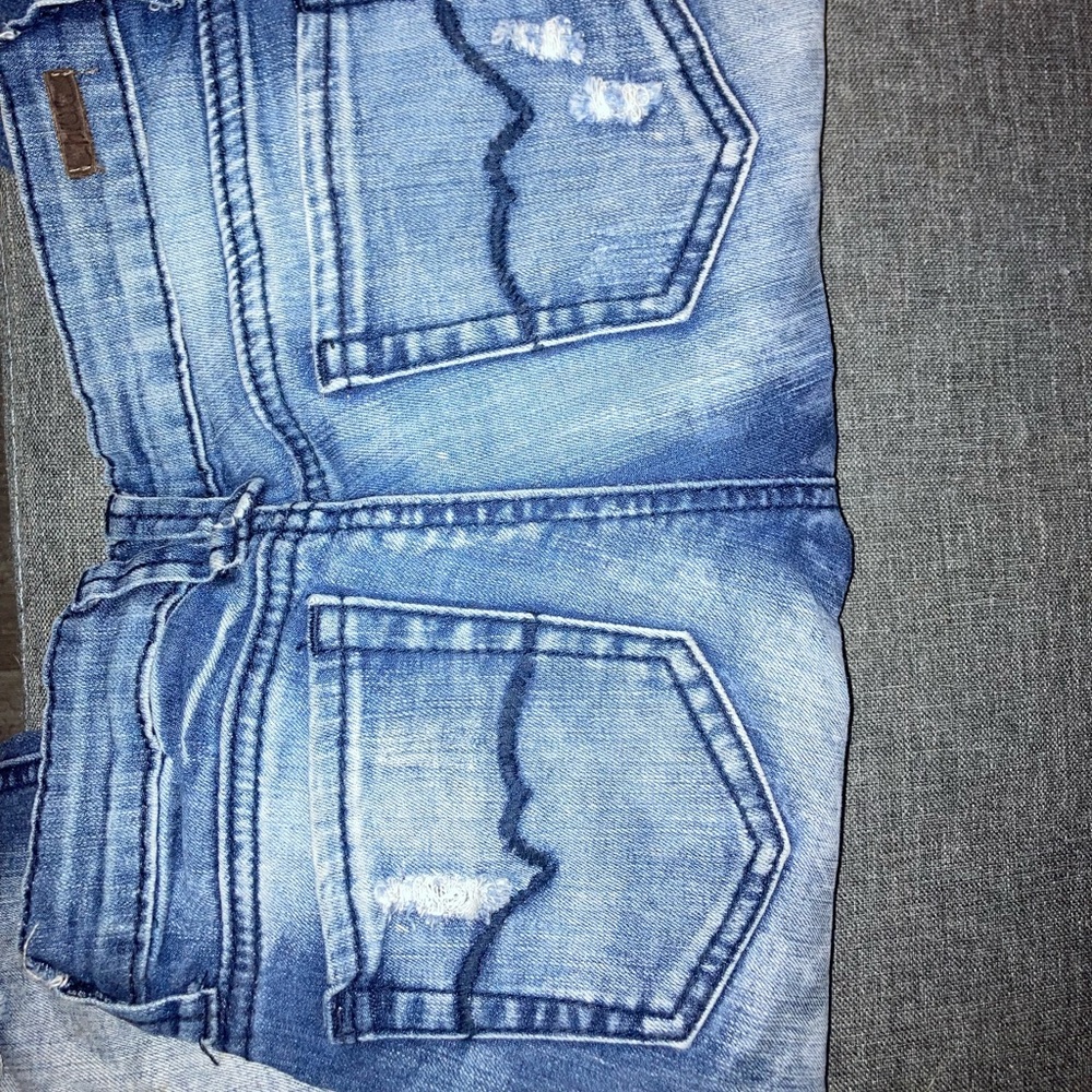 Blue jeans with rips